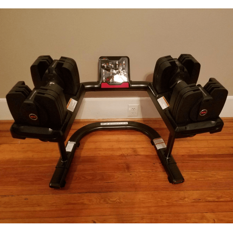 SelectTech 560 Adjustable Dumbbells on weight-stand