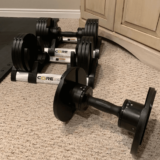 50 pounds Core Fitness adjustable dumbbells