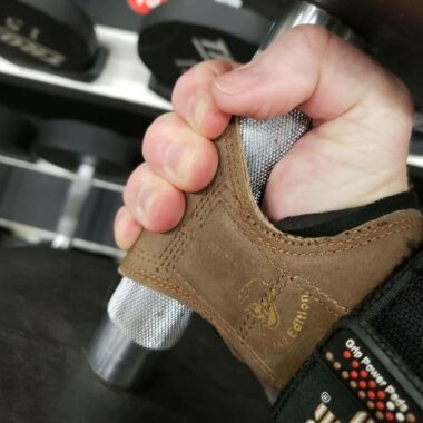 Cobra Grips Pro lifting straps gripping dumbbell